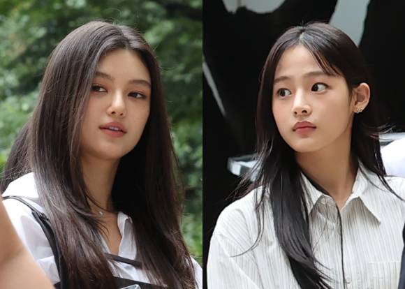 기획사 어도어와 전속계약 분쟁 중인 그룹 뉴진스의 다니엘과 민지가 지난 8월 14일 서울 서초구 서울중앙지방법원에서 열린 전속계약 유효확인 소송 1심 조정을 위해 법원으로 들어서고 있다. [사진=연합뉴스]