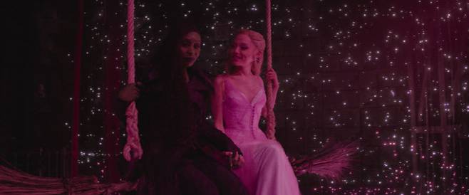 L to R: Cynthia Erivo is Elphaba and Ariana Grande is Glinda in WICKED FOR GOOD, directed by Jon M. Chu.