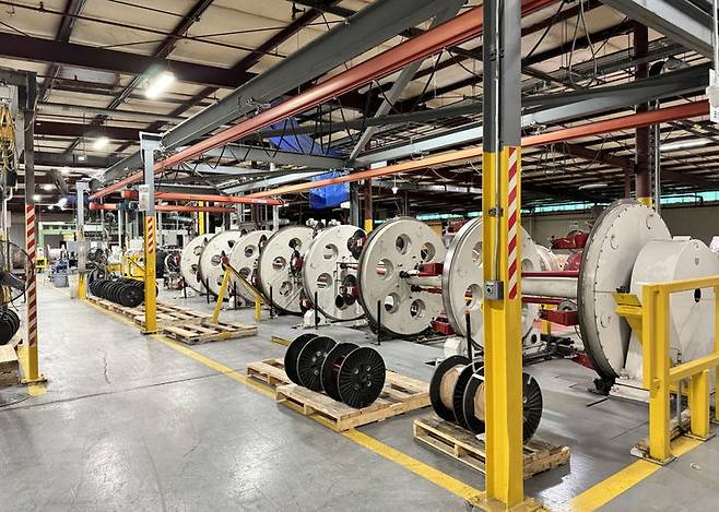 [서울=뉴시스]에식스솔루션즈 북미 공장 내 변압기용 특수 권선 설비. (사진 = LS) 2025.11.26. photo@newsis.com *재판매 및 DB 금지