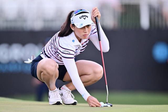 퍼팅을 준비하고 있는 지노 티띠꾼. 사진 제공=AFP연합뉴스