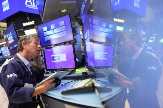 ▲ 뉴욕증권거래소(NYSE) 거래에서 트레이더들이 업무를 보고 있다.  [AFP. 연합뉴스 자료사진]