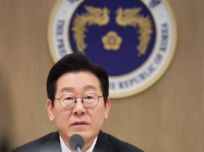 President Lee Jae Myung, center, speaks during a Cabinet meeting at the Yongsan presidential office in central Seoul on Dec. 9. [PRESIDENTIAL OFFICE]