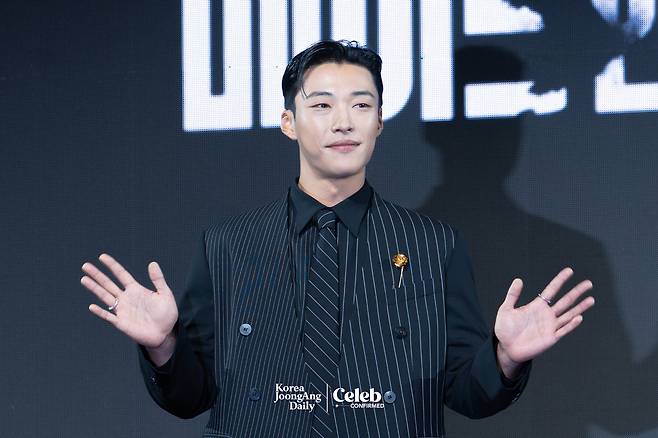 Actor Woo Do-hwan poses for photos during a press conference for the Disney+ series “Made in Korea” at the Grand InterContinental Seoul Parnas in southern Seoul on Dec. 15. [DANIELA GONZALEZ PEREZ]
