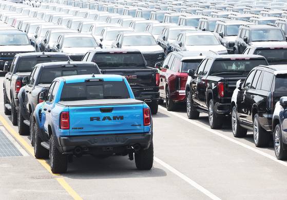 Vehicles from U.S. brands are parked at a port in Pyeongtaek, Gyeonggi, on July 31. [YONHAP]