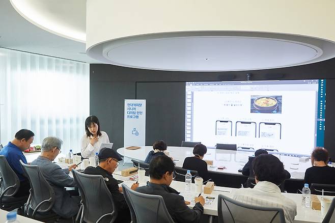 Participants take part in a senior digital program, a training program run by Hyundai Capital for its older customers. [HYUNDAI CAPITAL]