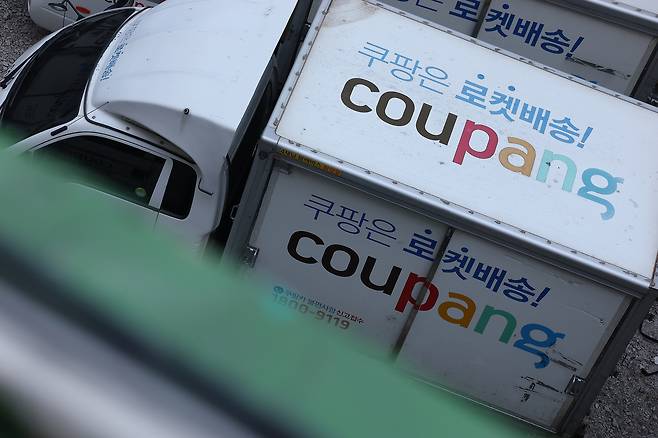 A Coupang delivery truck is seen parked at a lot in Seoul on Dec. 25. [YONHAP]