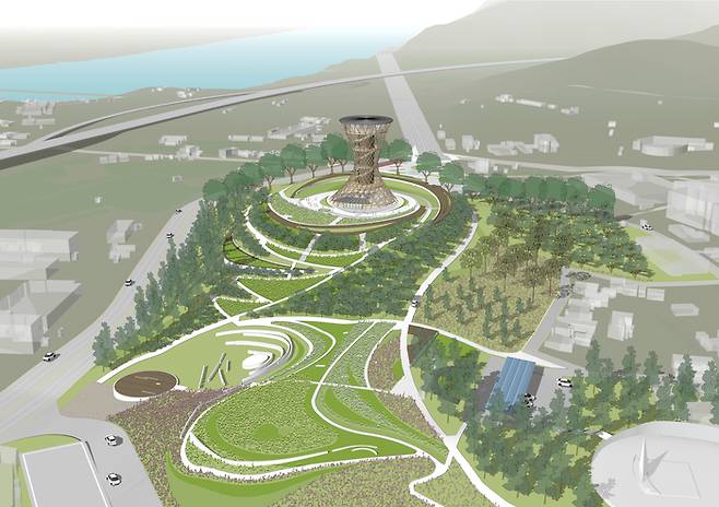 하동근린공원 정상부에 들어설 친환경 목조전망대 조감도. 공원 중심에 우뚝 선 전망대를 중심으로 원형 산책로와 녹지 공간이 단계적으로 펼쳐져 있으며, 자연 지형을 살린 보행 동선과 숲길이 어우러진 모습이다.<달성군 제공>