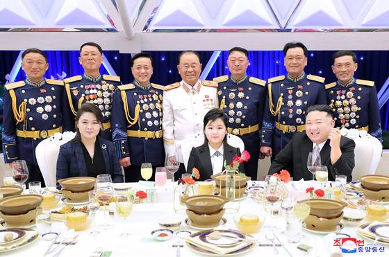 North Korean leader Kim Jong-un, right, is seen with his duaghter Kim Ju-ae, center, during an event marking the founding of the Korean People's Army on Feb. 8, 2023. [KOREAN CENTRAL NEWS AGENCY]