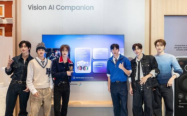Members of K-pop group RIIZE present Samsung Electronics’ “Vision AI Companion” AI TV platform at The First Look exhibition. (Samsung Electronics)
