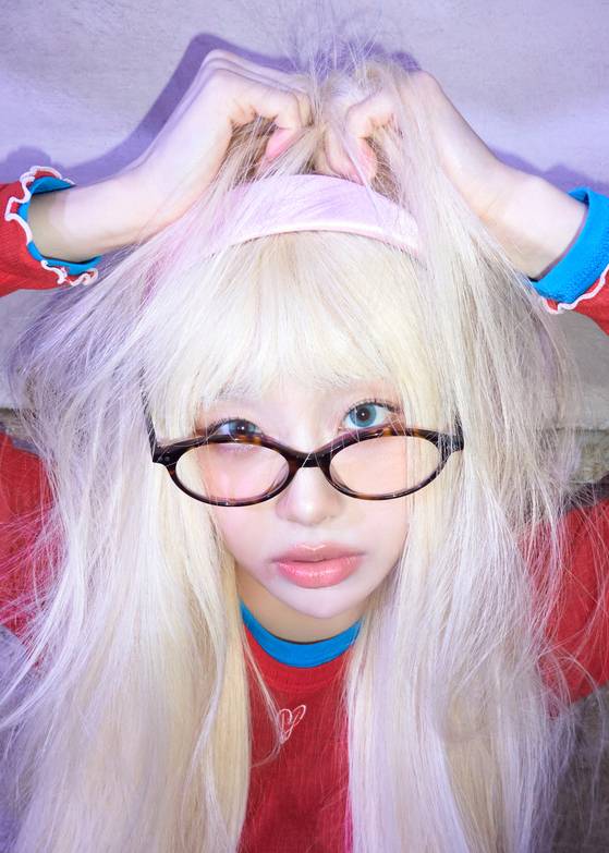 Singer Chuu in a promotional image for her first full-length album, ″XO, My Cyberlove″ [ATRP]
