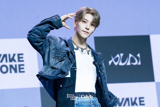 Alpha Drive One’s Xinlong poses for photos during a showcase for the release of the group’s first EP, ″Euphoria,″ at Blue Square in central Seoul on Jan. 12. [DANIELA GONZALEZ PEREZ]