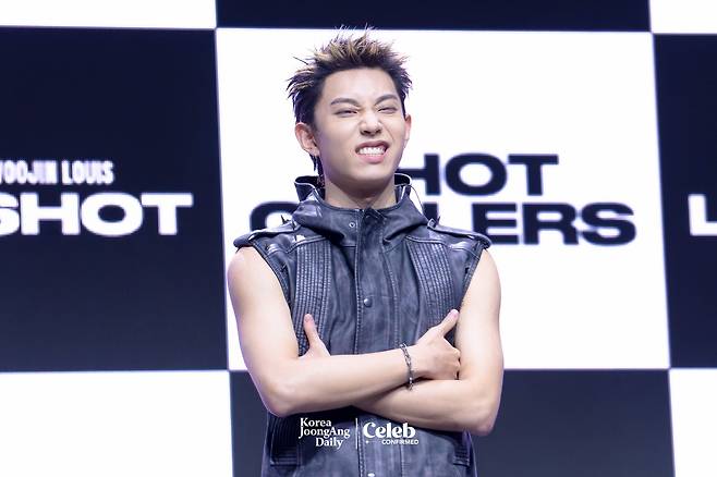 LNGSHOT’s Ryul poses for photos during a showcase for the release of the group’s first EP, ″Shot Callers,″ at Myunghwa Live Hall in western Seoul on Jan. 13. [DANIELA GONZALEZ PEREZ]