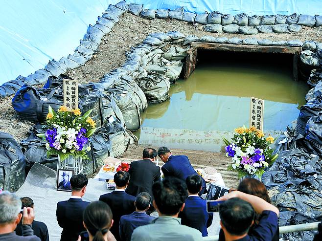 Bereaved family members of those killed at the Chosei coal mine on Feb. 3, 1942, are seen during a memorial ceremony near the mine site on Oct. 27, 2024. [YONHAP]