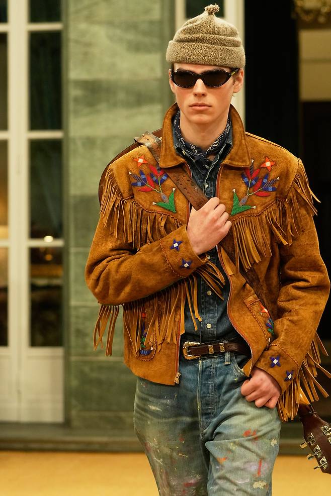 A model wears a creation as part of the Ralph Lauren fall-winter 2026-2027 men's collection presented in Milan on Jan. 16. (AP Photo/Luca Bruno)