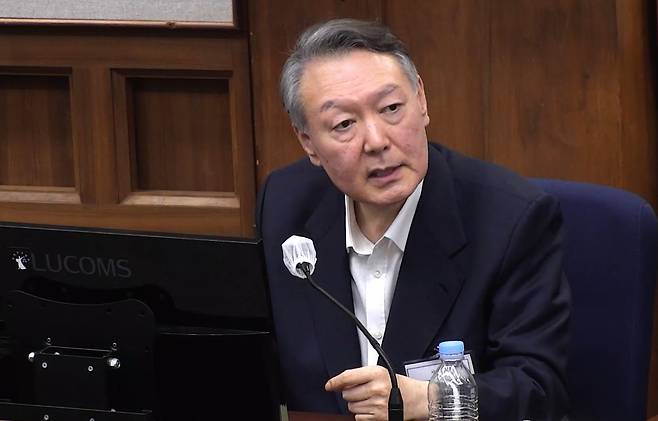 Former President Yoon Suk Yeol speaks at his trial on charges of leading an insurrection at the Seoul Central District Court in Seocho District, southern Seoul, on Dec. 29, 2025. [SEOUL CENTRAL DISTRICT COURT]