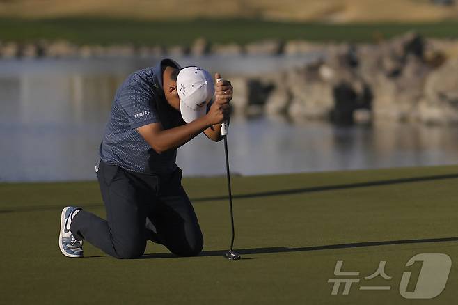 김시우(31)가 26일(한국시간) 열린 PGA투어 아메리칸 익스프레스 최종 4라운드에서 퍼트 실패 후 아쉬워 하고 있다. ⓒ AFP=뉴스1