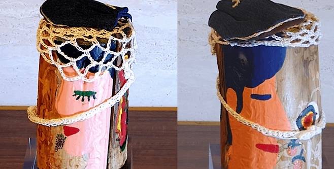 제주 삼나무의 뒤틀린 결 위에 더해진 색과 형상. 베어짐 이후의 시간을 작품 안에 남겼다. (한국리본ReBorn협회)