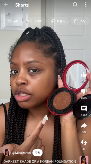 Screen shot from content creator Miss Darcei's review of TirTir's Mask Fit Red Cushion (YouTube)