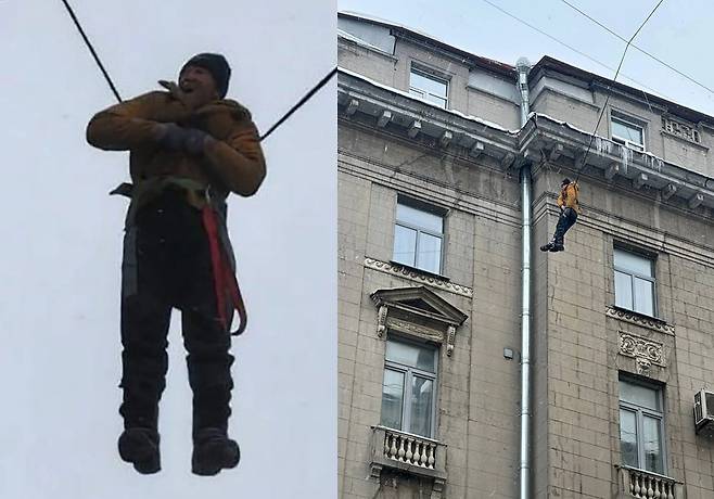 옥상에서 추락했으나 전선에 걸려 기적적으로 생존한 유리창 청소부 [더 선]