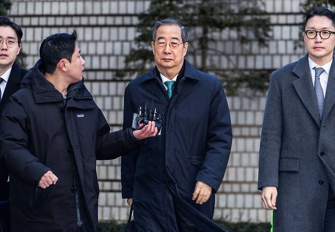 한덕수 전 국무총리가 1월21일 서울 서초구 서울중앙지법에서 열린 내란 우두머리 방조, 내란 중요임무 종사 혐의 사건 1심 선고공판에 출석하고 있다. ⓒ시사저널 최준필