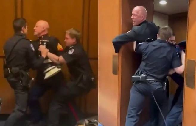 미국 해병대 출신인 브라이언 맥기니스 녹색당 상원의원 후보가 이란 공습에 항의하다 청문회장에서 끌려나가는 모습. 엑스 캡처