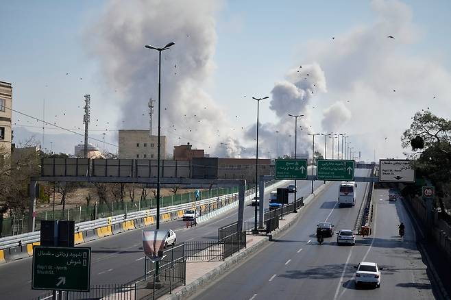 Plumes of smoke rise as strikes hit Tehran during the U.S.-Israeli military campaign on March 5. [AP/ YONHAP]