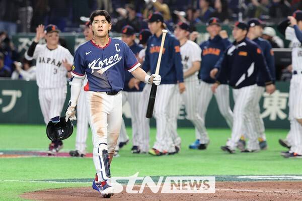 한국 야구대표팀은 7일 일본 도쿄돔에서 열린 월드베이스볼클래식(WBC) 일본과 경기에서 8-6으로 패배했다. 대표팀 주장 이정후가 경기 후 아쉬움을 감추지 못하고 있다. /사진=뉴시스