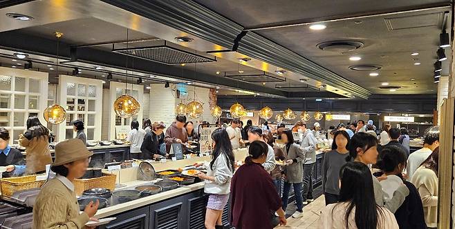 People eat at an Ashley Queens in this undated photo. [E-LAND EATS]