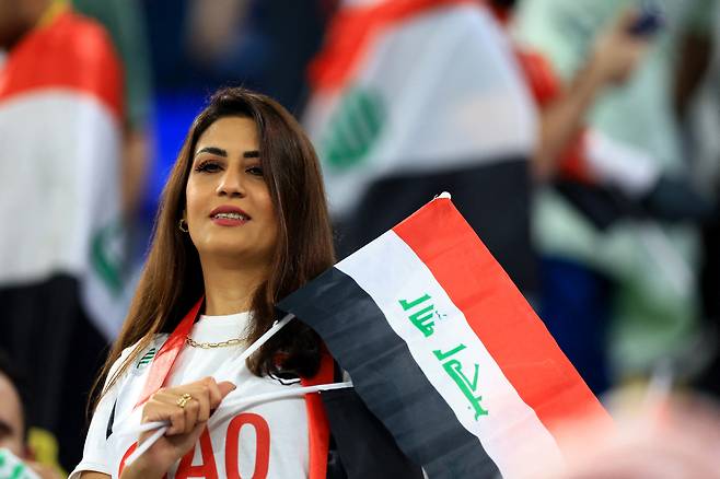 이라크 축구대표팀을 응원하는 팬. 로이터