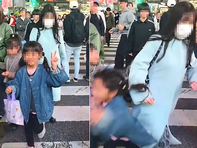 지난달 24일 일본 도쿄 시부야 스크램블 교차로에서 한 여성이 여자 아이를 밀치고 지나가는 모습. 사진 SNS 캡처