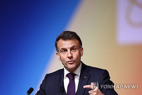 민간 원자력 정상회의에서 개막 연설하는 마크롱 대통령 [EPA 연합뉴스 재판매 및 DB 금지]