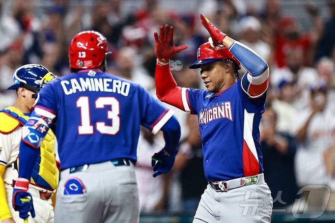 도미니카공화국은 12일(한국시간) 열린 베네수엘라와 2026 WBC 1라운드 D조 최종전에서 홈런 네 방을 몰아쳐 7-5로 승리했다. ⓒ AFP=뉴스1 ⓒ AFP=뉴스1