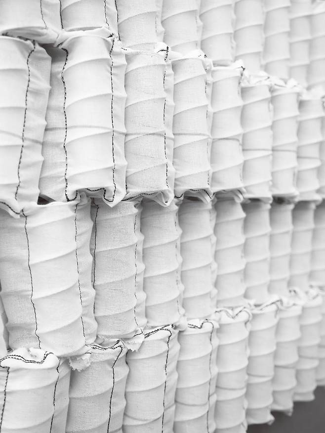 각각의 스프링을 독립된 천 주머니(포켓)에 담는 ‘포켓 스프링’을 처음 개발한 곳이 바로 바이스프링이다(인피니 사진 제공).