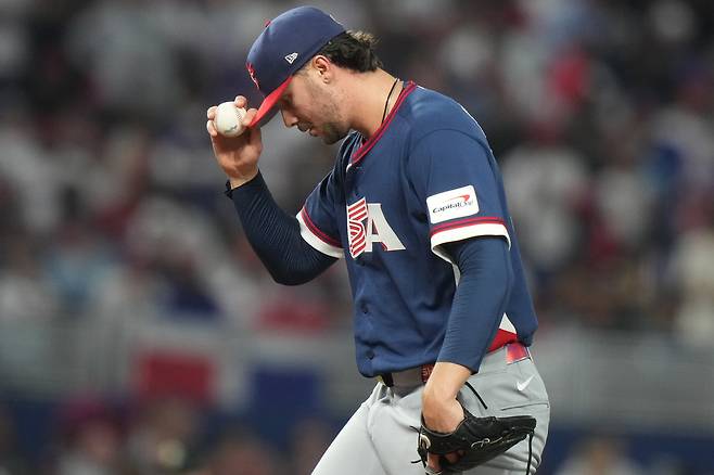 United States pitcher Paul Skenes pauses on the mound during the third inning of a World Baseball Classic semifinal game against the Dominican Republic, Sunday, March 15, 2026, in Miami. (AP Photo/Lynne Sladky)
