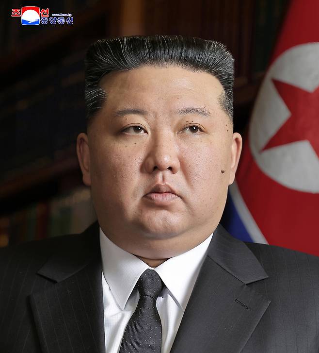 North Korean leader Kim Jong-un is pictured at the first-day session of the 15th Supreme People’s Assembly in Pyongyang on March 22, where he was reappointed as chairman of the state affairs commission, in this photo carried by the Korean Central News Agency on March 23. [YONHAP]