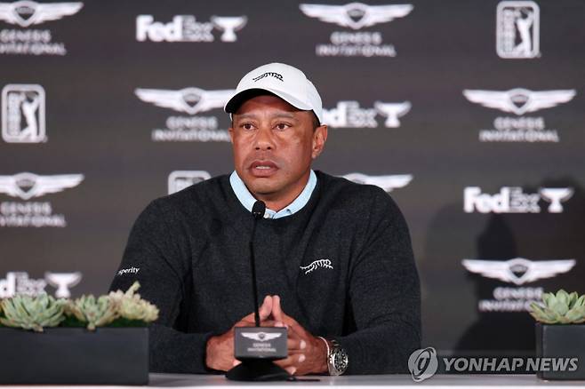 기자회견 하는 우즈_[로이터=연합뉴스] Mandatory Credit: Kiyoshi Mio-Imagn Images