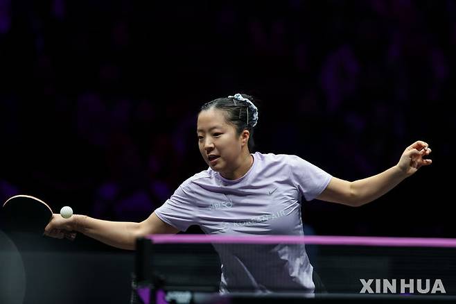 [충칭=신화/뉴시스] 신유빈이 14일(현지 시간) 중국 충칭에서 열린 2026 월드테이블테니스(WTT) 챔피언스 충칭 여자 단식 8강전에서 왕이디(중국)와 경기하고 있다. 신유빈이 3-4(7-11 5-11 6-11 12-10 11-7 11-6 2-11)로 패해 4강에 오르지 못했다. 2026.03.15.