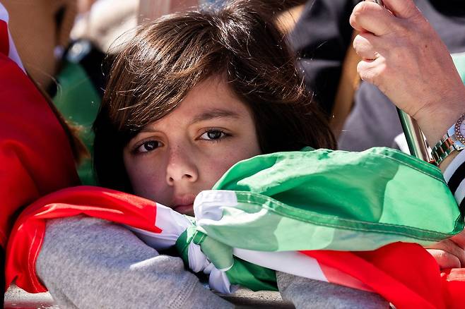 현지시간 29일 미국 워싱턴에서 열린 집회에 참석한 어린이. 이날 워싱턴에선 미국의 이란 공격을 지지하는 집회가 진행됐다. 로이터=연합뉴스