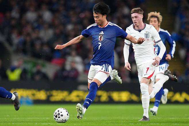 잉글랜드를 무너뜨린 일본 미토마. AP=연합뉴스