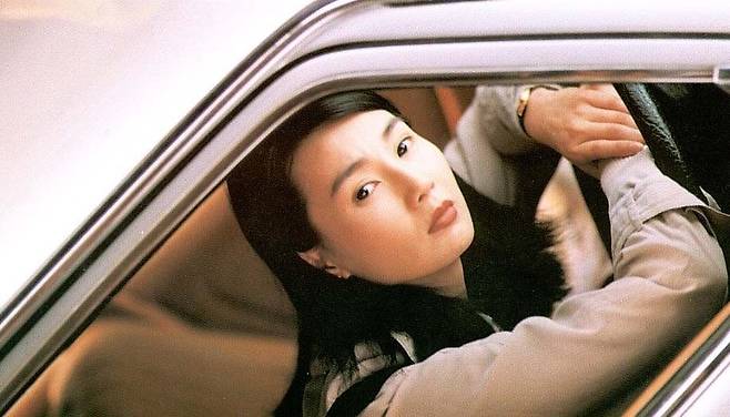 영화 '첨밀밀'은 각자의 꿈을 안고 중국 본토에서 홍콩으로 향한 두 남녀가 만남과 이별을 반복하며 이어가는 인연을 그렸다. 사진 워너브러더스 코리아