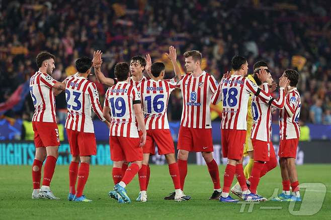 바르셀로나를 잡은 뒤 기뻐하는 아틀레티코 마드리드 선수들 ⓒ AFP=뉴스1