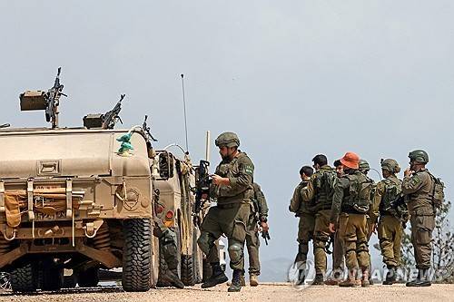 레바논 국경 인근에서 순찰중인 이스라엘군 병사들 [AFP 연합뉴스 자료사진. 재판매 및 DB 금지]