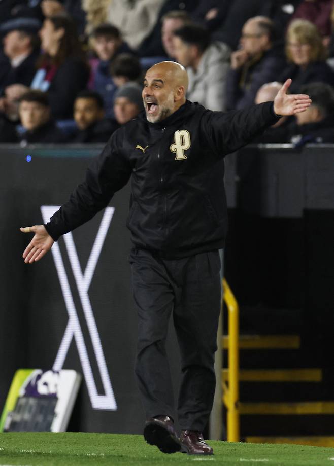 번리전에 나선  과르디올라   로이터<저작권자(c) 연합뉴스, 무단 전재-재배포, AI 학습 및 활용 금지>