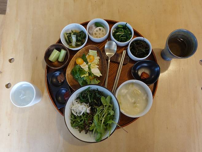 The barley-based bansang (full-table setting meal) menu at Pul, a vegan restaurant in Mangwon [LIM JEONG-WON]