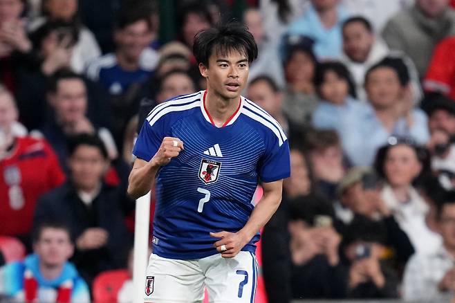 Japan's Kaoru Mitoma celebrates after scoring his side's first goal during the International friendly soccer match between England and Japan in London, Tuesday, March 31, 2026 . (AP Photo/Kirsty Wigglesworth)







<저작권자(c) 연합뉴스, 무단 전재-재배포, AI 학습 및 활용 금지>