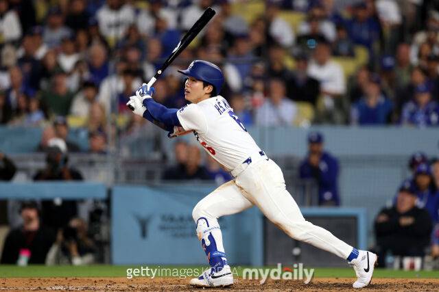 김혜성이 25일 컵스와 경기에서 적시타를 터뜨리고 있다. /게티이미지코리아