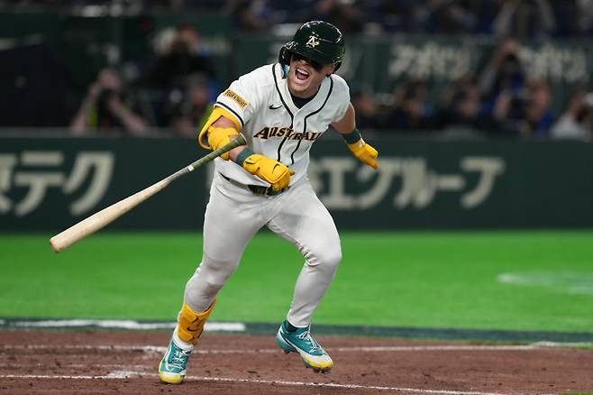 <yonhap photo-7512=""> Australia's Travis Bazzana reacts after hitting single during the eighth inning of a World Baseball Classic game between South Korea and Australia on Monday, March 9, 2026 in Tokyo. (AP Photo/Eugene Hoshiko)/2026-03-09 21:49:43/ <저작권자 ⓒ 1980~2026 ㈜연합뉴스. 무단 전재 재배포 금지, AI 학습 및 활용 금지></yonhap>