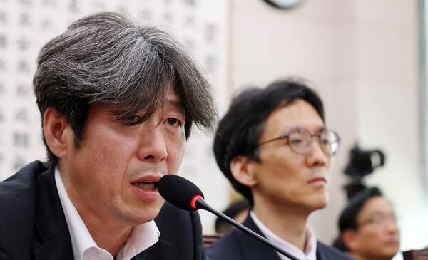 대장동 민간업자 남욱 변호사가 16일 국회 '윤석열 정권 정치검찰 조작기소 의혹 사건 진상규명' 국정조사특별위원회에서 열린 대장동·위례 개발비리 및 김용 전 민주연구원 부원장 관련 의혹 사건에 대한 청문회에서 의원 질의에 답하고 있다. 2026.4.16. 연합뉴스