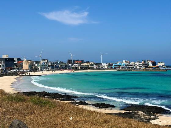 The sun shines at Woljeongri Beach in Jeju on April 5. [JIM BULLEY]