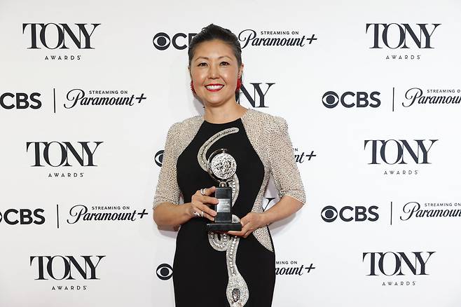 Linda Cho, winner of the Best Costume Design of a Musical  poses with the award for "The Great Gatsby" in a Musical  at the 77th Annual Tony Awards in New York City, U.S., June 16, 2024.